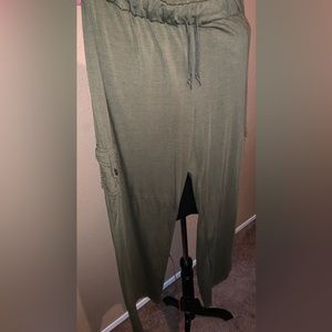 Soft and flowing lounge pants with rear and side leg pockets. NWOT